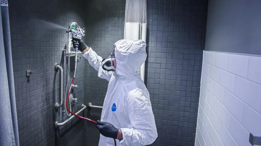 Titan Airless Disinfectant Sprayers - Shower-Spraying-1024x576