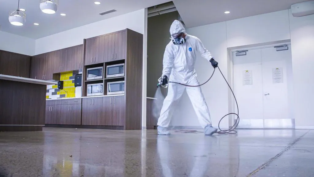 Titan Airless Disinfectant Sprayers - Titan Breakroom -Spraying-1024x576