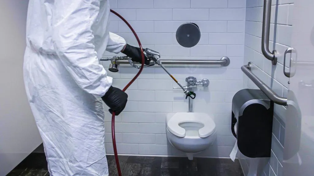 Titan Airless Disinfectant Sprayers - Titan Restroom -Spraying-1024x576