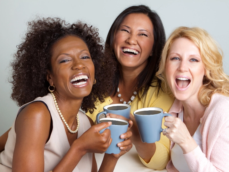Ladies Drinking Coffee With Smailes
